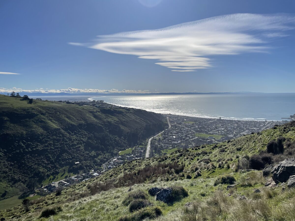 View from a mountain looking down at sumner and new brighton beaches  in Christchurch with the ocean on the right